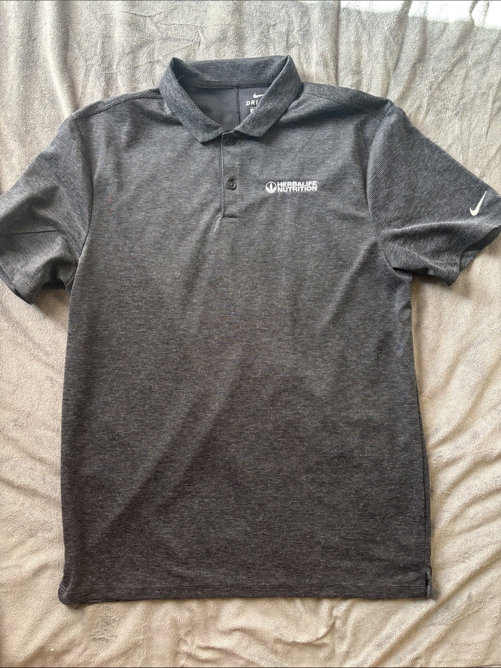 Nike Men’s Dark Gray Polo with White Herbal Life Logo